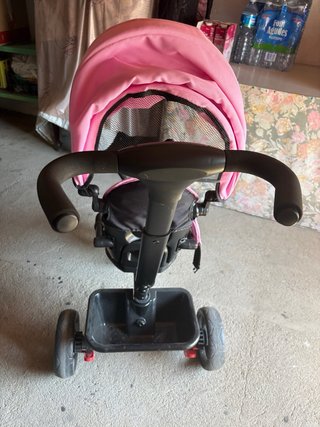 Triciclo infantil rosa y negro