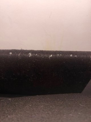 Sofá cama gris de tela