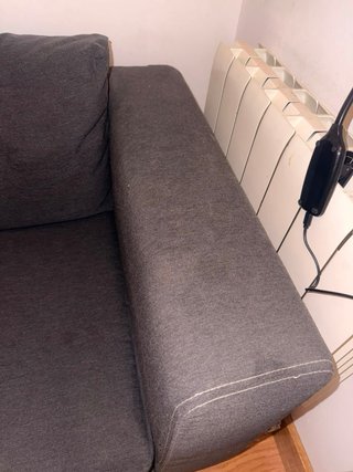 Sofá cama gris de tela