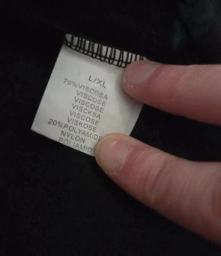 Pantaloni neri con banda laterale