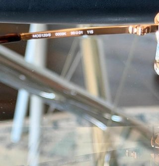 Gafas de sol Moschino doradas y marrones