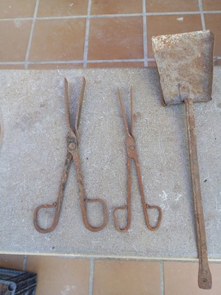 Pinzas y palas para fuego