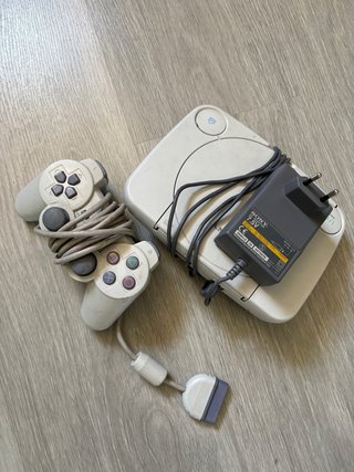Consola Sony PS1 con mandos y adaptador