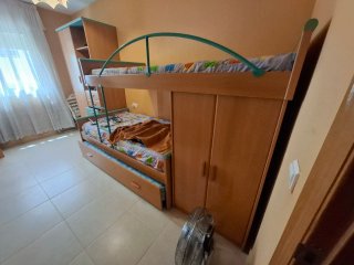 Habitación juvenil literas con armario