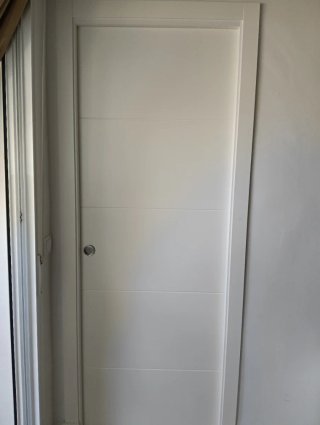 Puerta corredera de madera