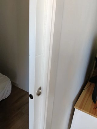 Puerta corredera de madera
