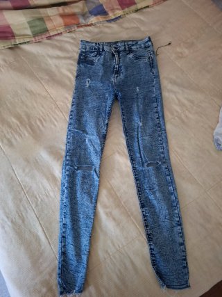 Pantalones vaqueros desgastados azules