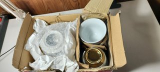 Juego de té porcelana 13 piezas con soporte