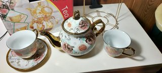 Juego de té porcelana 13 piezas con soporte