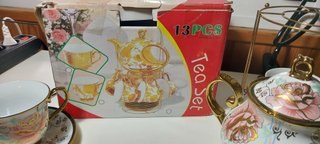 Juego de té porcelana 13 piezas con soporte