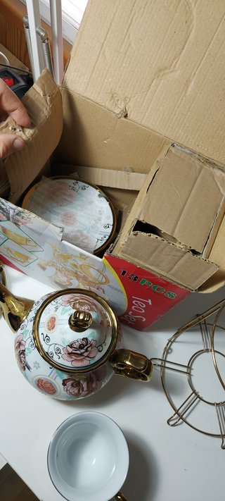 Juego de té porcelana 13 piezas con soporte