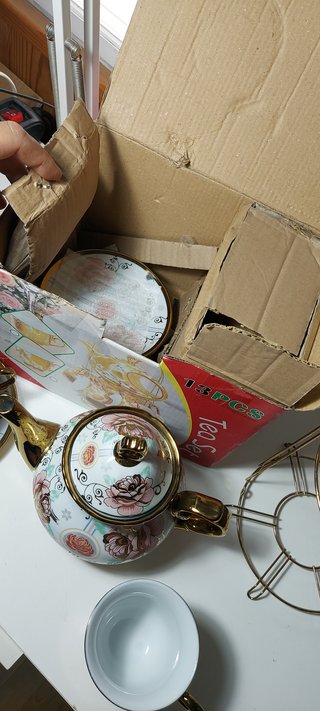 Juego de té porcelana 13 piezas con soporte