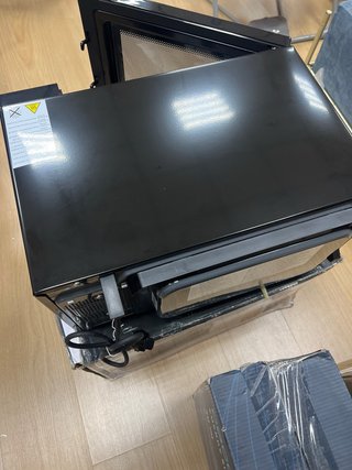 Microondas Candy Moderna CMGA23TNDB con Grill