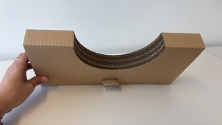Soporte de cartón semicircular . 1800 unidades
