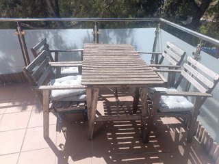 Mesa y 4 sillas de exterior madera