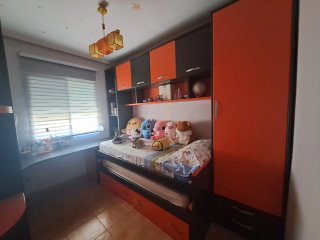 Dormitorio juvenil naranja/marrón