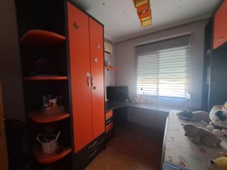 Dormitorio juvenil naranja/marrón