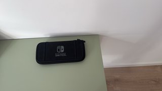 Nintendo Switch + Funda + Juegos FIFA y Just Dance