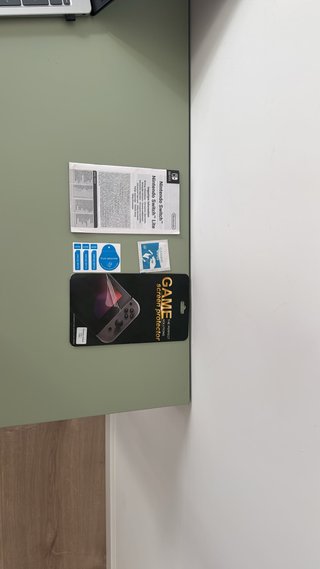 Nintendo Switch + Funda + Juegos FIFA y Just Dance