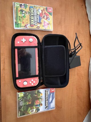 Nintendo Switch Lite Coral + Juegos