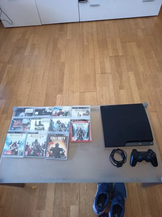 Playstation 3 Slim Negra + Juegos