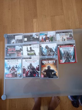 Playstation 3 Slim Negra + Juegos