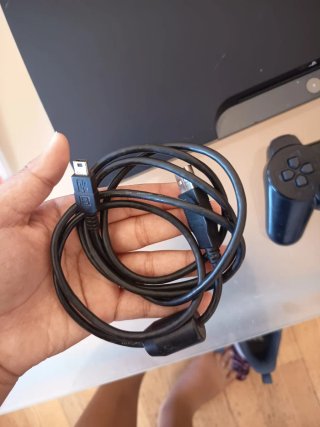 Playstation 3 Slim Negra + Juegos
