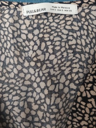 Blusa corta estampada manga larga