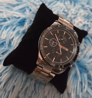 Reloj nuevo en Caja