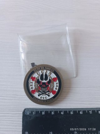 Dos monedas (anverso y reverso) de coleccionista.