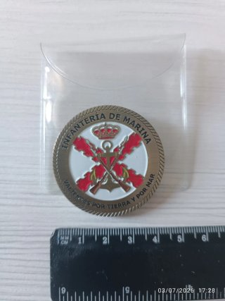 Dos monedas (anverso y reverso) de coleccionista.