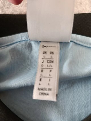 Camiseta Adidas x Oasis Azul y Negra