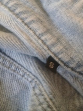 Chaqueta vaquera desgastada