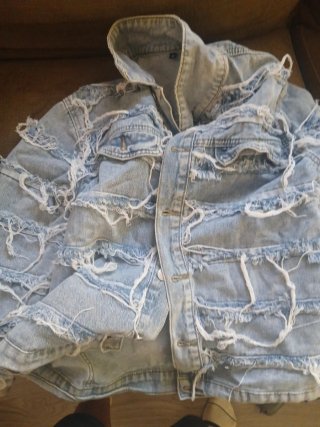 Chaqueta vaquera desgastada
