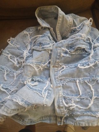 Chaqueta vaquera desgastada