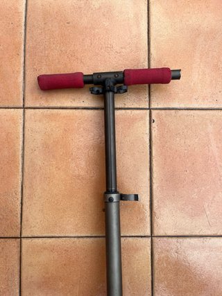 Patinete Oxelo plegable rojo con suspensión