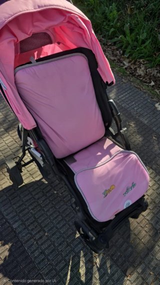 Cochecito de paseo rosa precio negociable