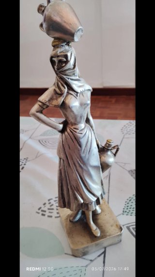 Figura bañada en plata