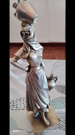 Figura bañada en plata