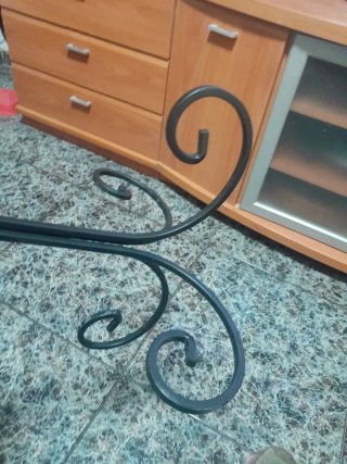Porta macetas de hierro forjado