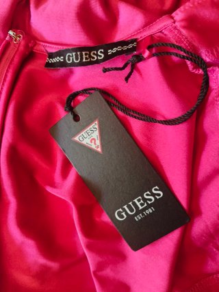 Mono fucsia, Guess. Nuevo.