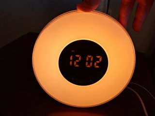 Radio despertador con sonidos naturales e iluminac