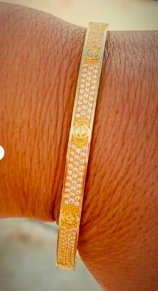 Pulsera laminada en oro 18k