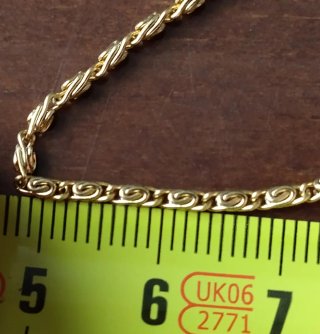 Cadena dorada con cierre ¿chapada oro?