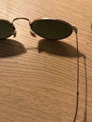 Gafas Ray-Ban montura dorada cristales negros