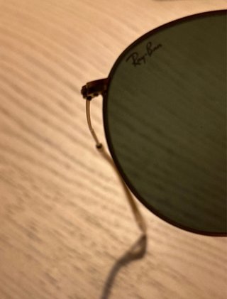 Gafas Ray-Ban montura dorada cristales negros