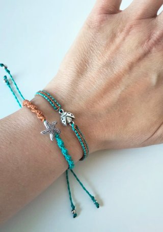 Coppia di bracciali stella marina e coccinella