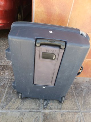 Maleta rígida con ruedas gris