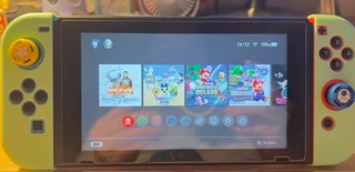Nintendo Switch+Funda Zelda+SD 128GB + Jueg