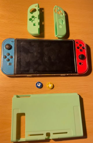 Nintendo Switch+Funda Zelda+SD 128GB + Jueg